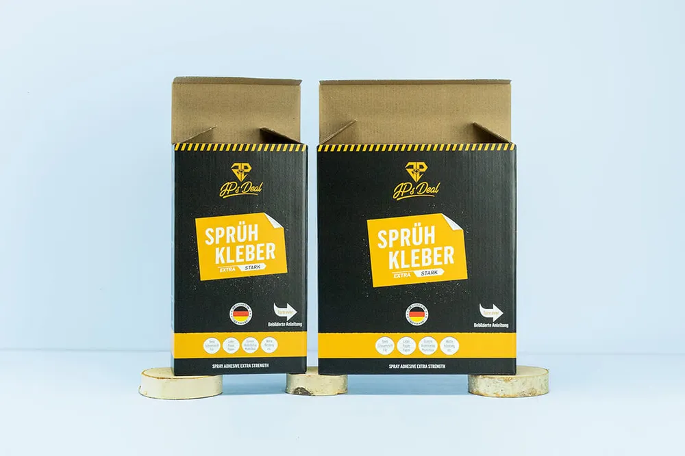 Folding boxes made of corrugated cardboard in black and yellow Folding boxes made of corrugated cardboard in black and yellow